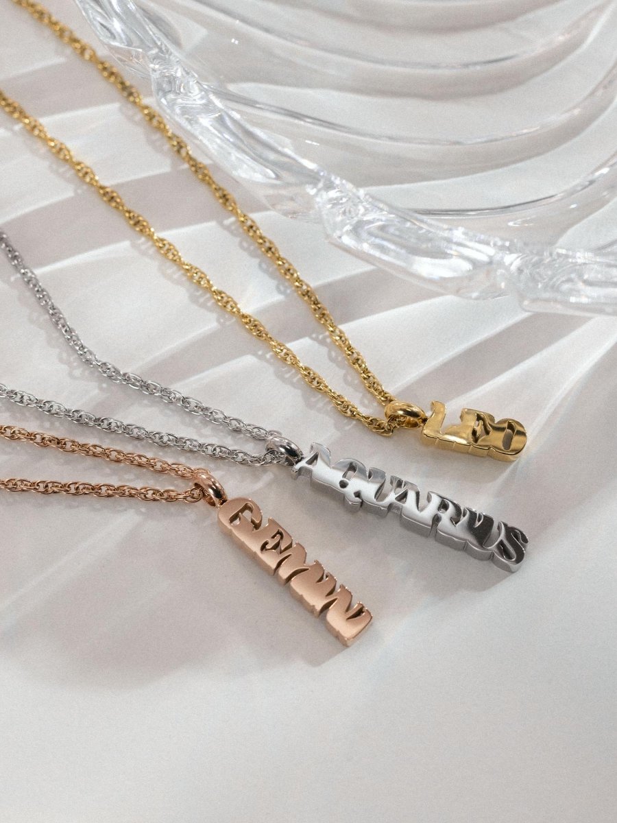 Leo Letter Charm - INT PURELEI